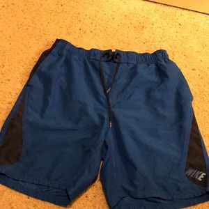 Royal blue and navy blue swim trunks